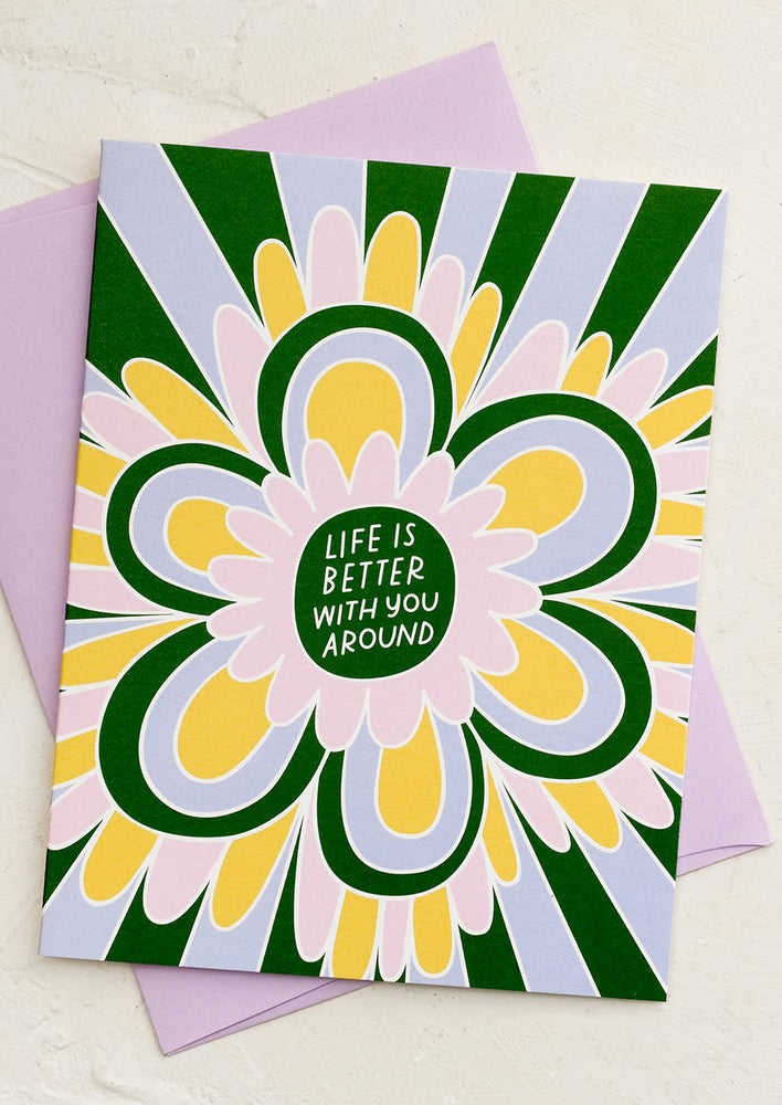 A greeting card reading "Life is better with you around".