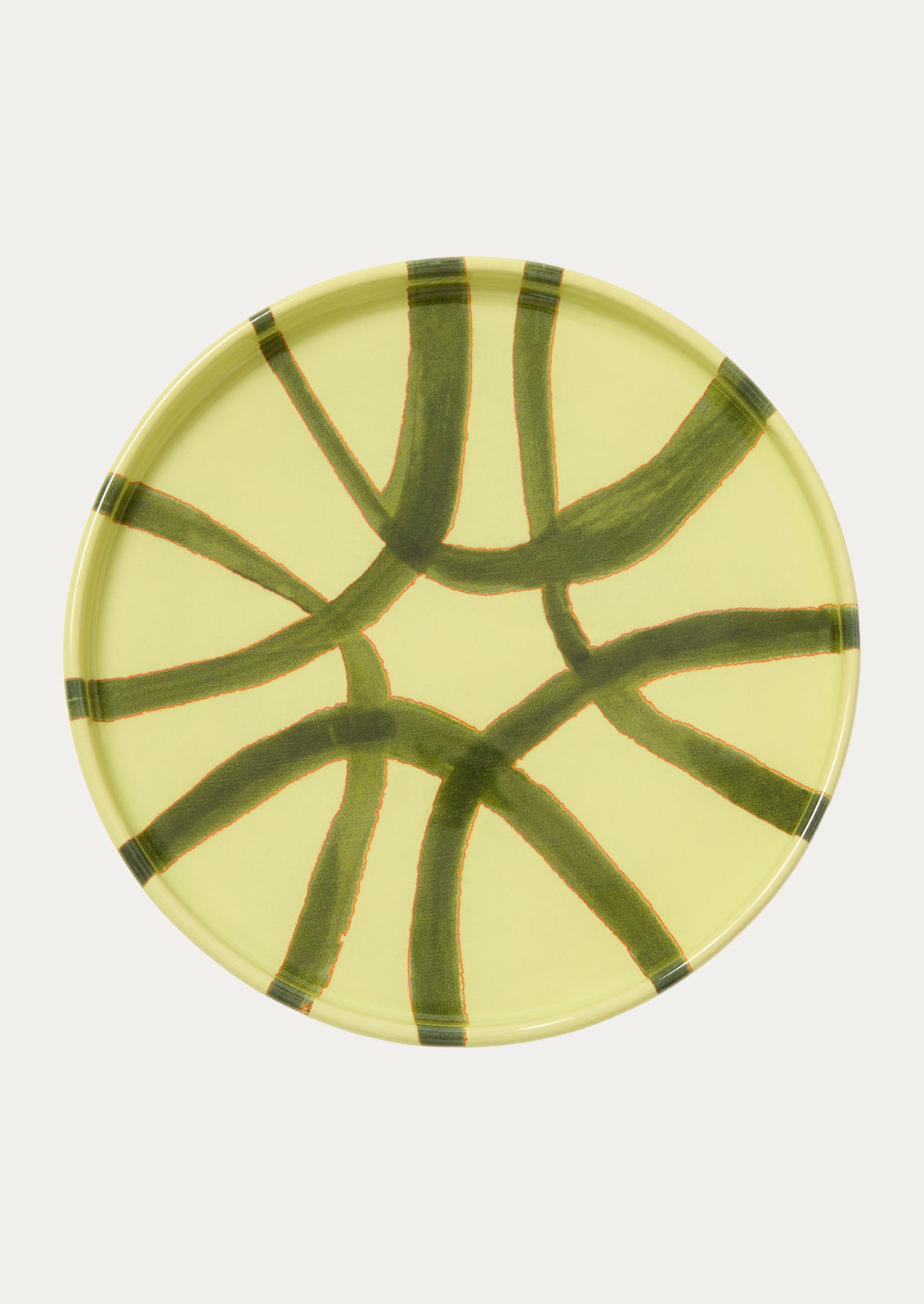 A ceramic side plate wth an abstract design in a lime green color.