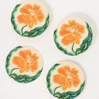Marigold: Paper coasters with marigold print.