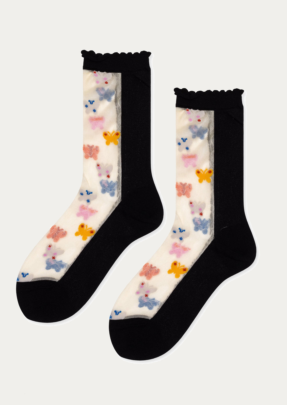 Pair of socks with colorful butterfly pattern on a white background