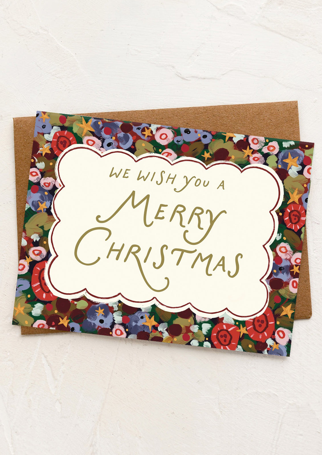Christmas card with floral design and 'Merry Christmas' text on a white background