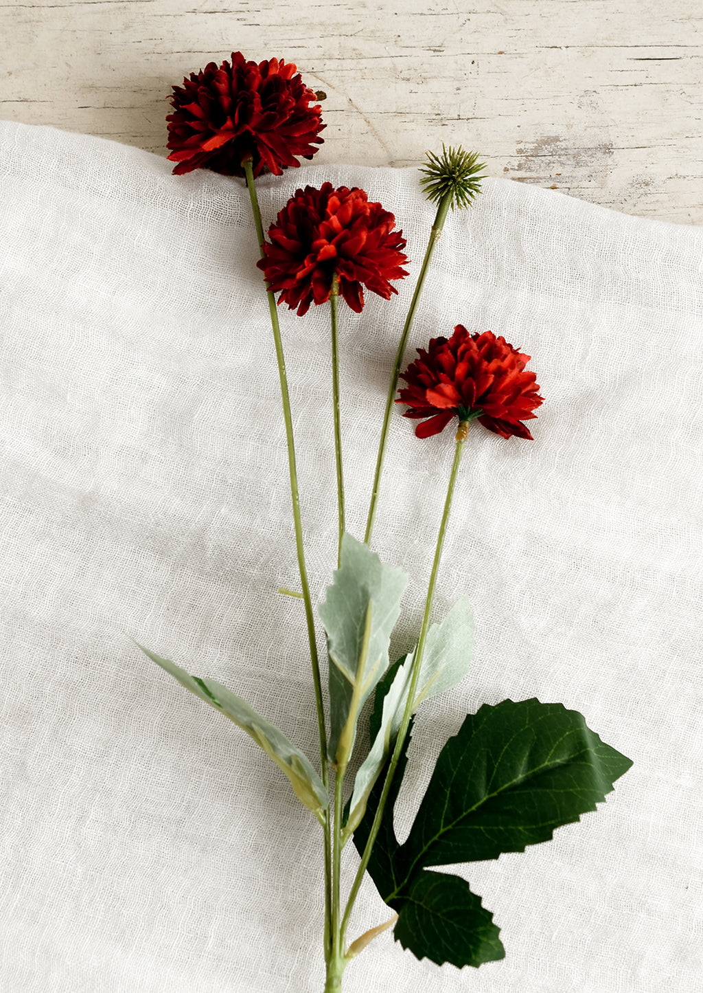 Berry Red: An artificial flower spray in the style of a red mum.