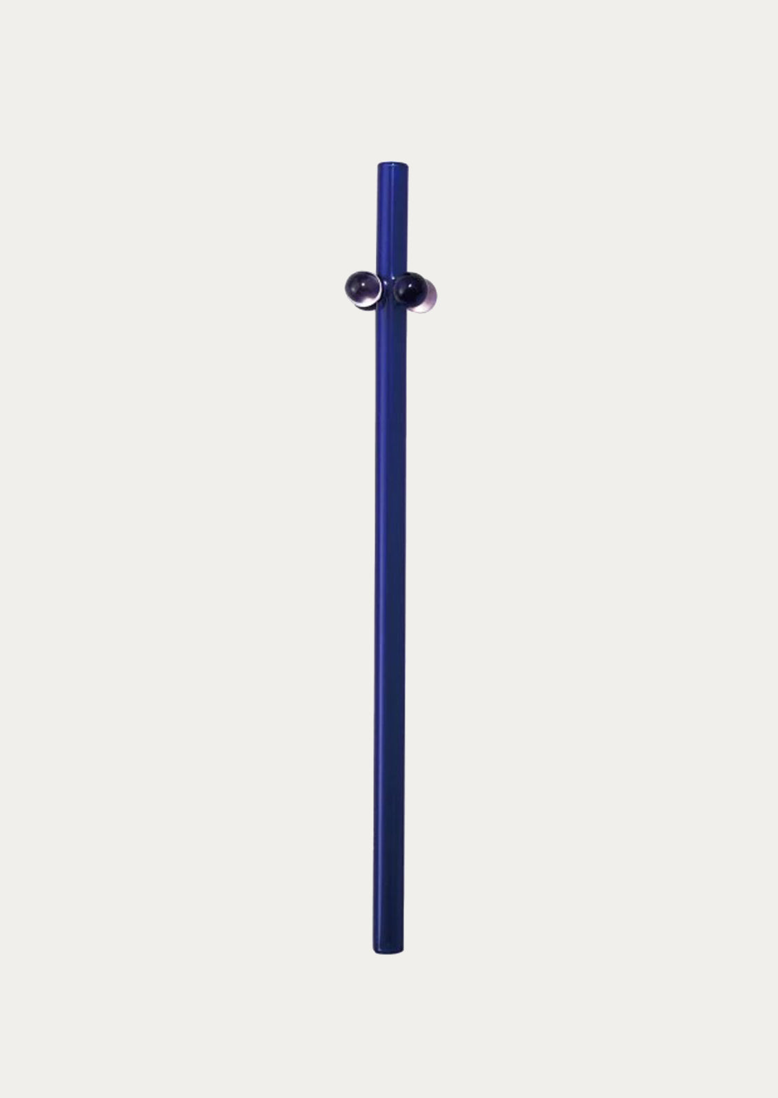 Blue glass straw with a spherical fitting on a white background