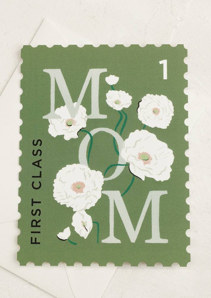 1: A diecut stamp shape card reading "First class mom".