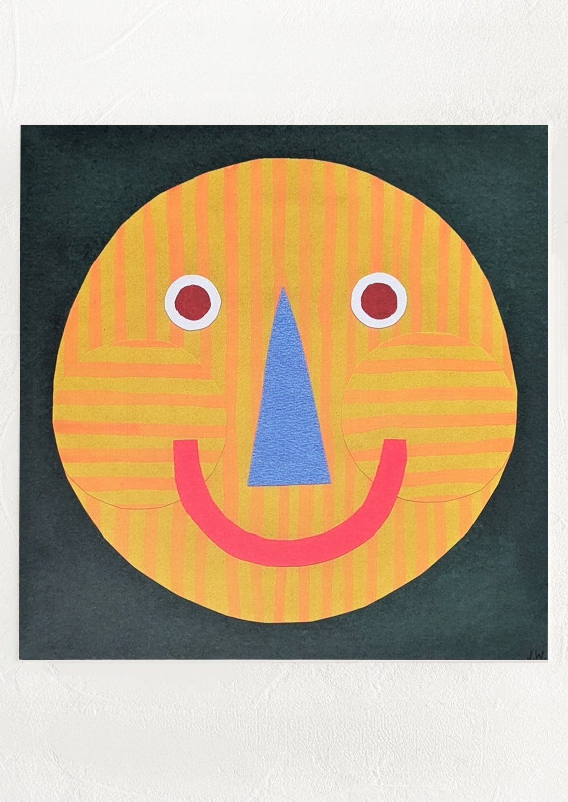 Colorful smiley face design on a black background