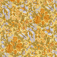 3: A mustard floral print tablecloth.