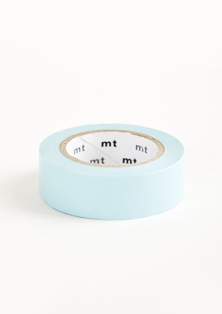Aqua: A roll of washi tape in sky blue color.