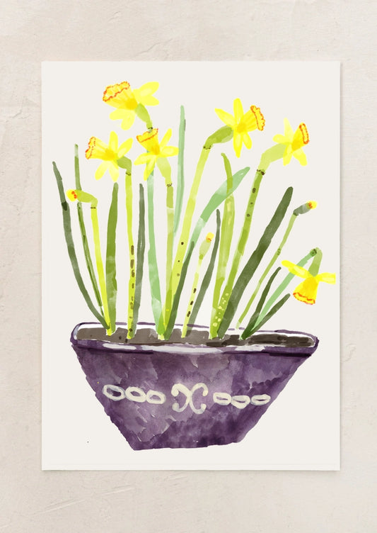 An art print depicting yellow daffodils in a bowl.