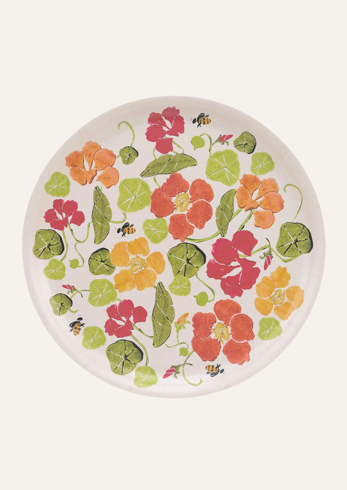 A wooden circle tray with an illustration of nasturtium flowers and bees.