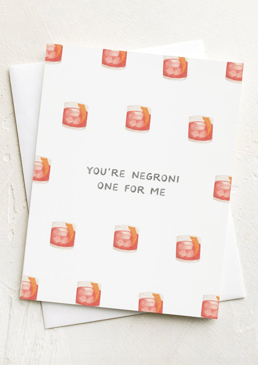 Greeting card with negroni glass pattern and text 'You're Negroni One for Me'.