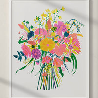 2: An art print with neon bouquet, in white frame.