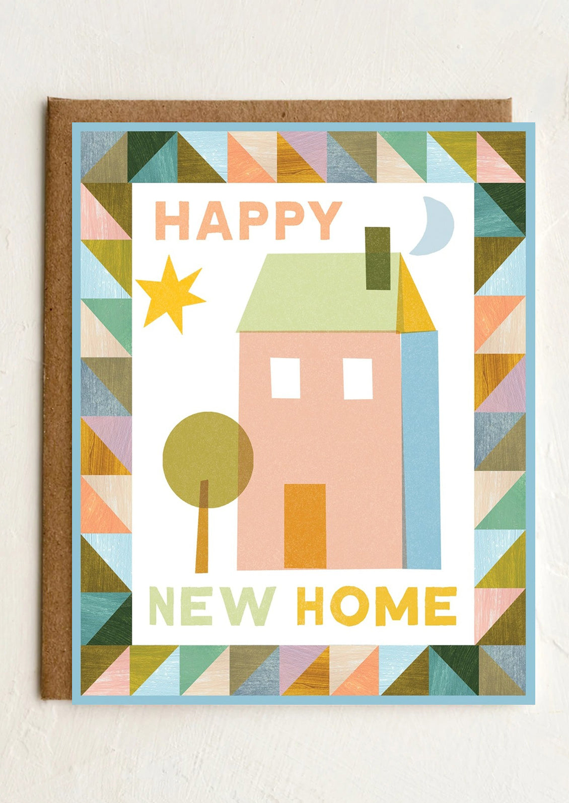 Colorful greeting card with geometric design, house illustration, and 'Happy New Home' text on a white background.