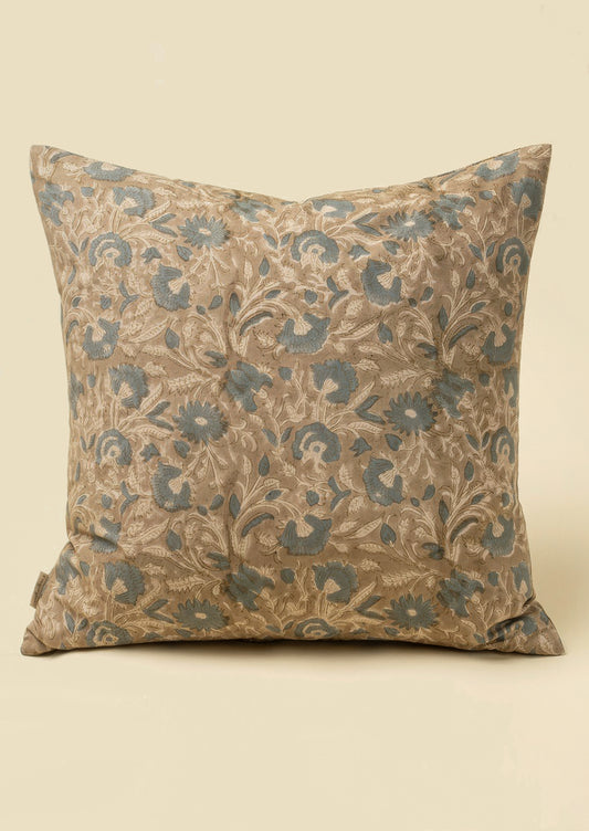 A block printed cotton throw pillow in taupe and dusty blue floral pattern.