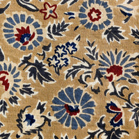 2: A floral print napkin set in brown, indigo and red.