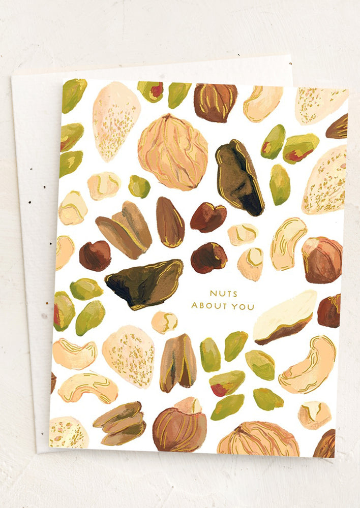 A nut illustrated card reading "Nuts about you".
