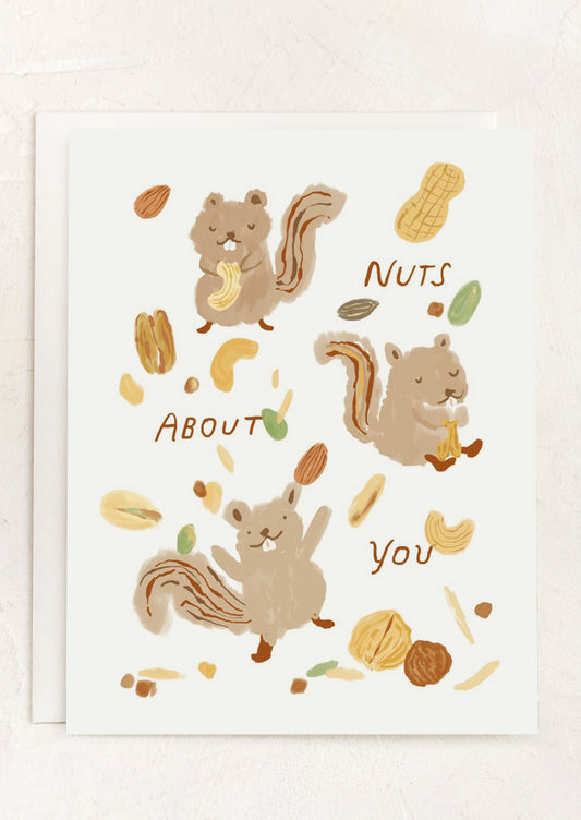 An illustrate card reading "Nuts about you".