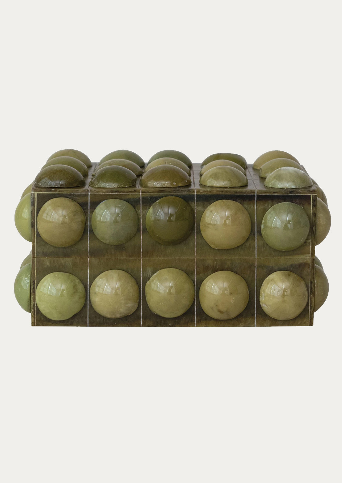 A hobnail textured storage box in olive green.