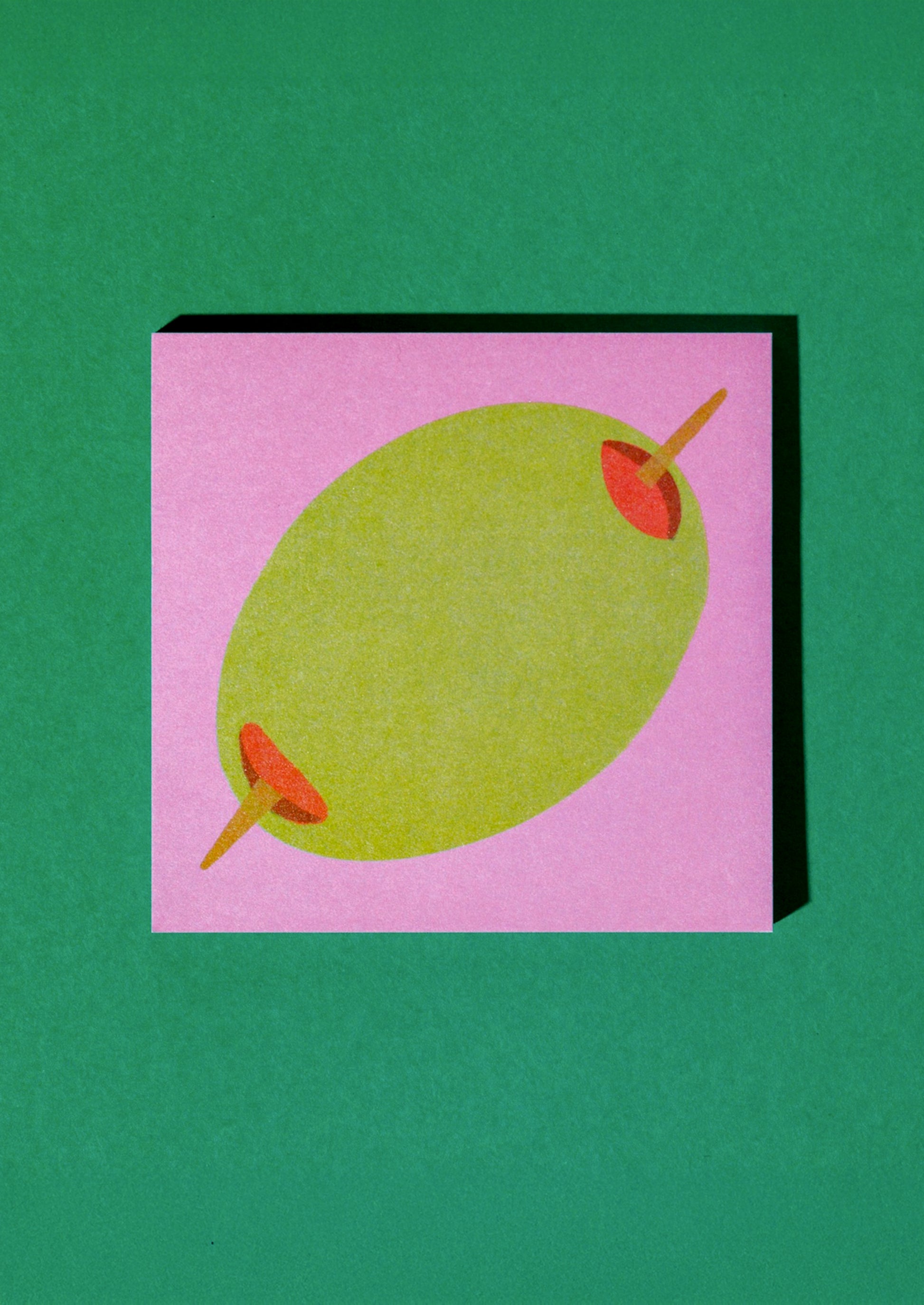 A stack of sticky notes with printed olive theme on pink background.