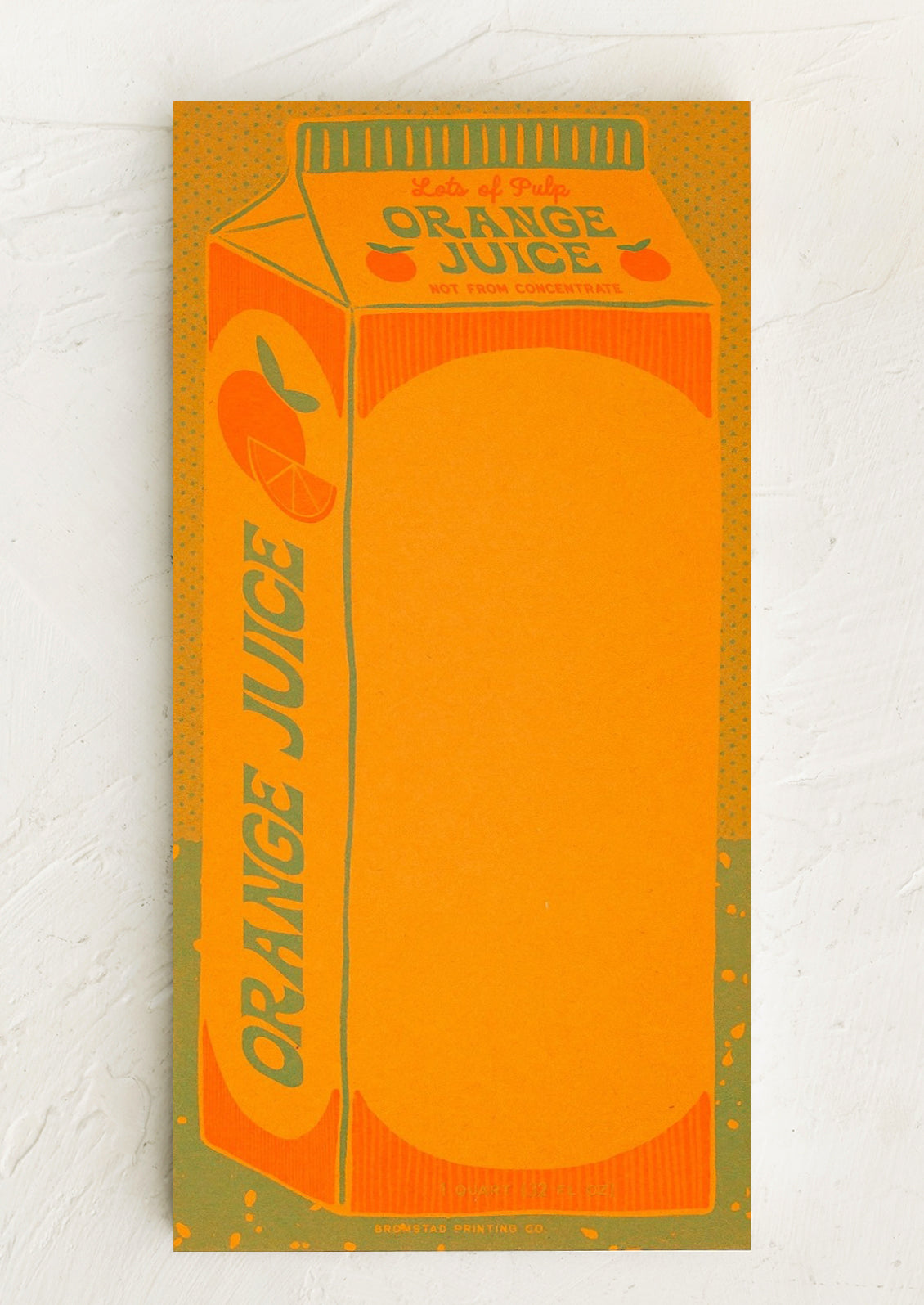 A notepad designed to look like a carton of orange juice.