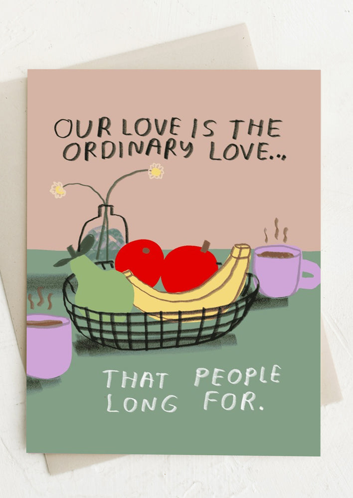 1: A card reading "Our love is the ordinary love that people long for".