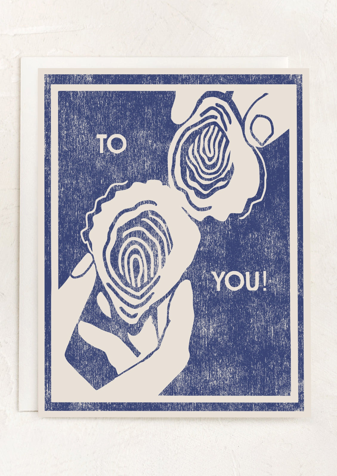 Greeting card with image of two hands cheersing with oysters and 'To You!' text on a blue background.