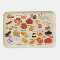 1: A printed tray with pastries pattern.