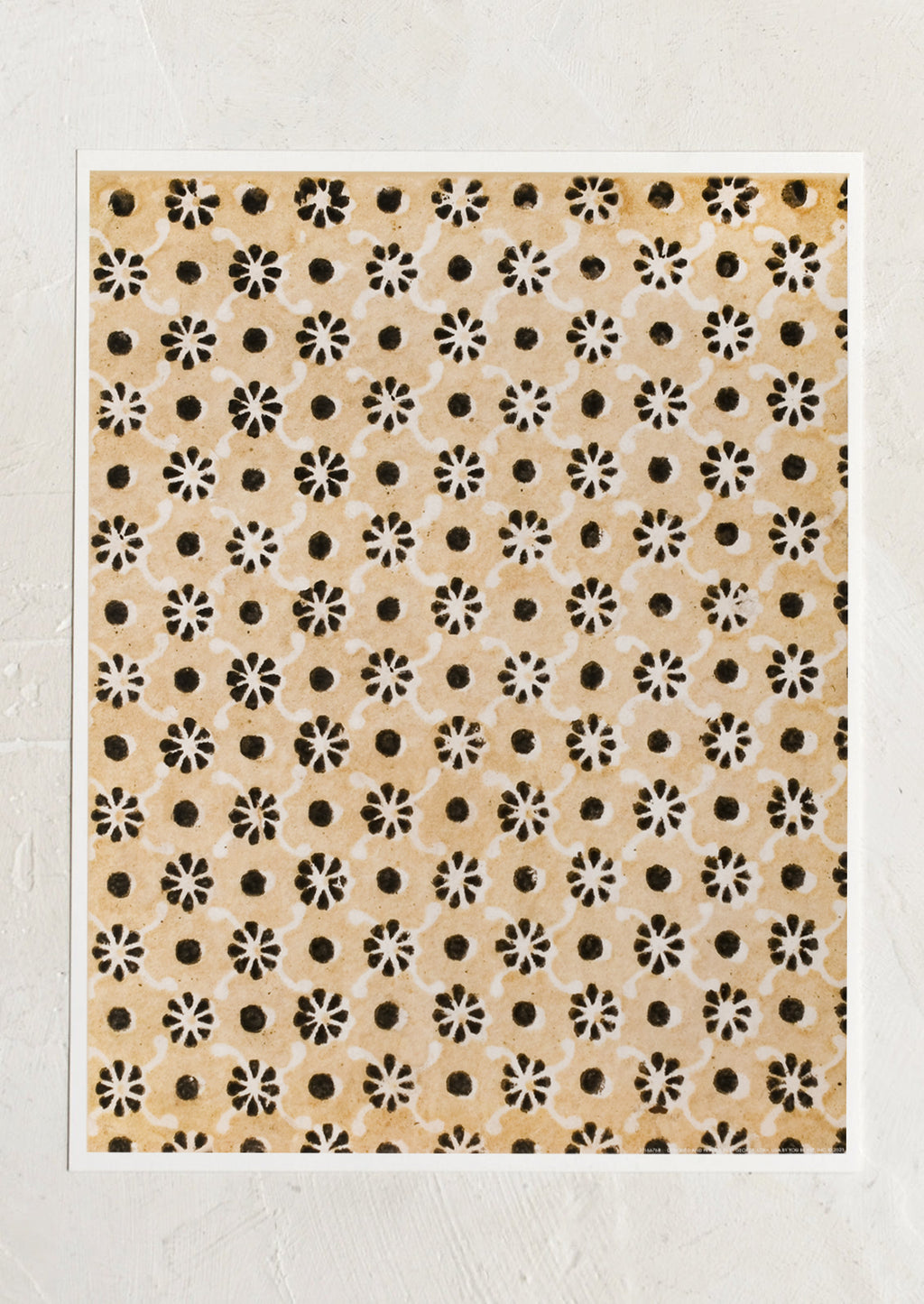 1: An art print that looks like a block printed textile in beige and black flower pattern.