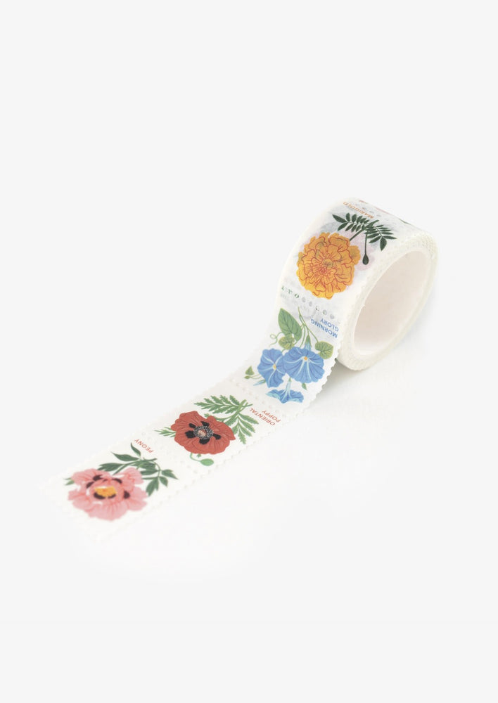 Floral stamp washi tape with perforated design.