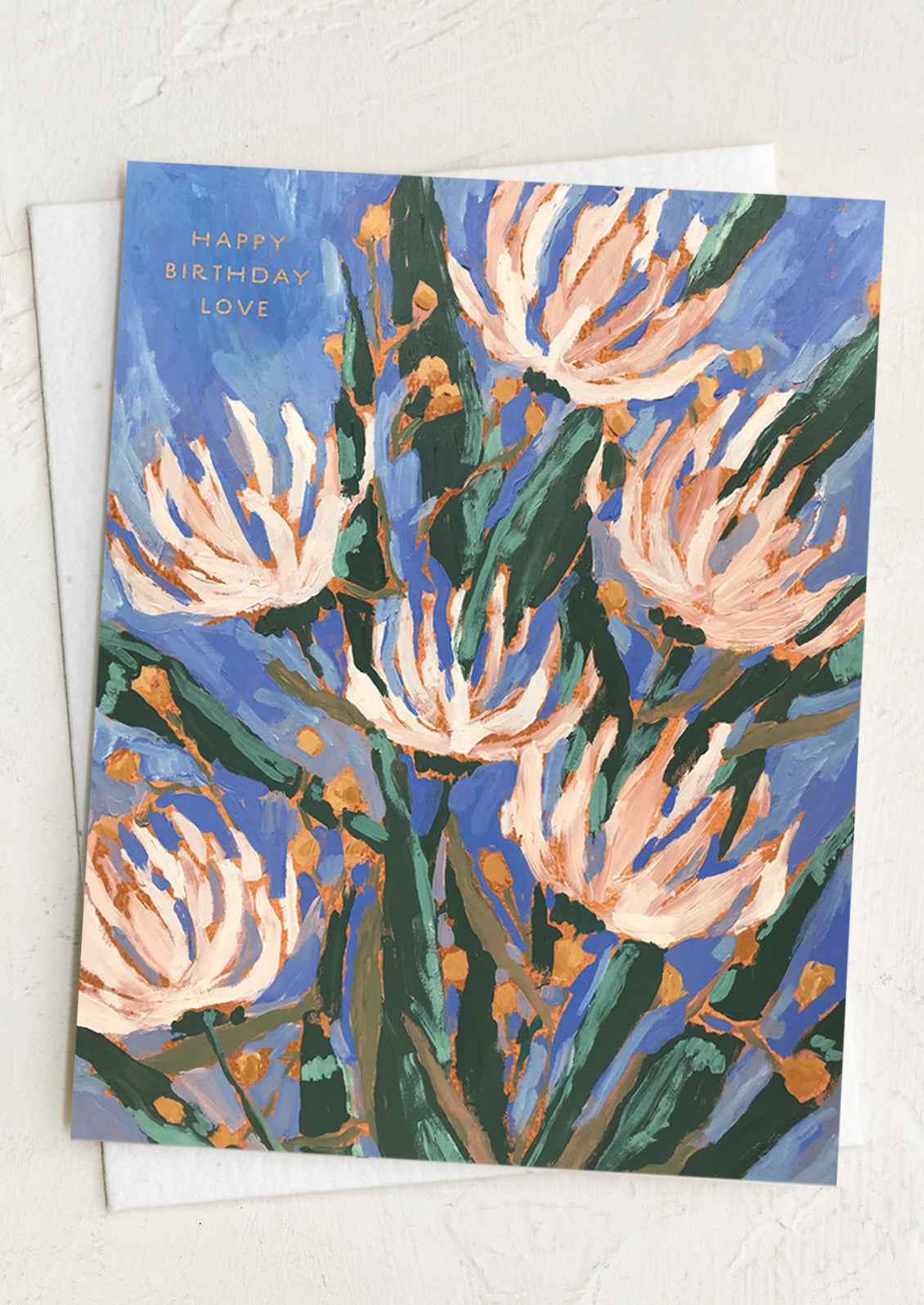 Greeting card with floral design and 'Happy Birthday Love' text on a blue background