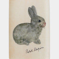 1: A rectangular tray with illustration of grey bunny.