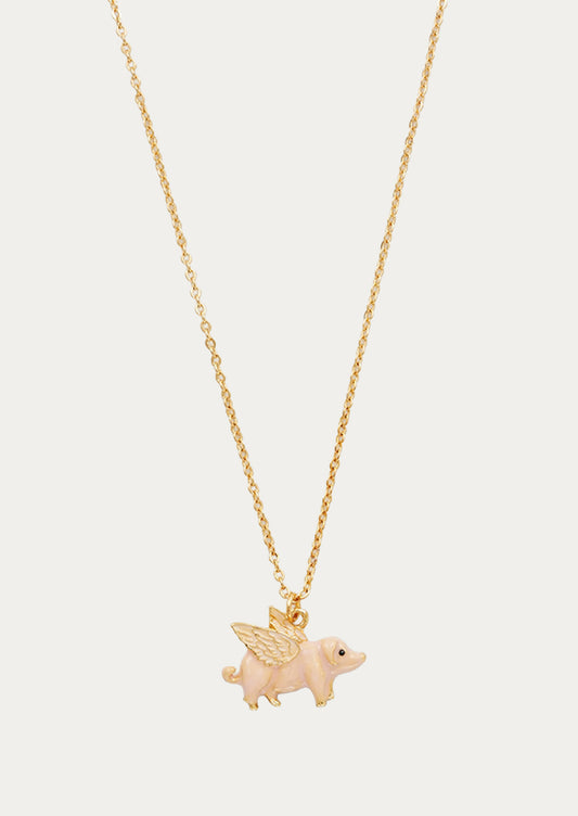 A gold plated chain necklace with a flying pig charm.
