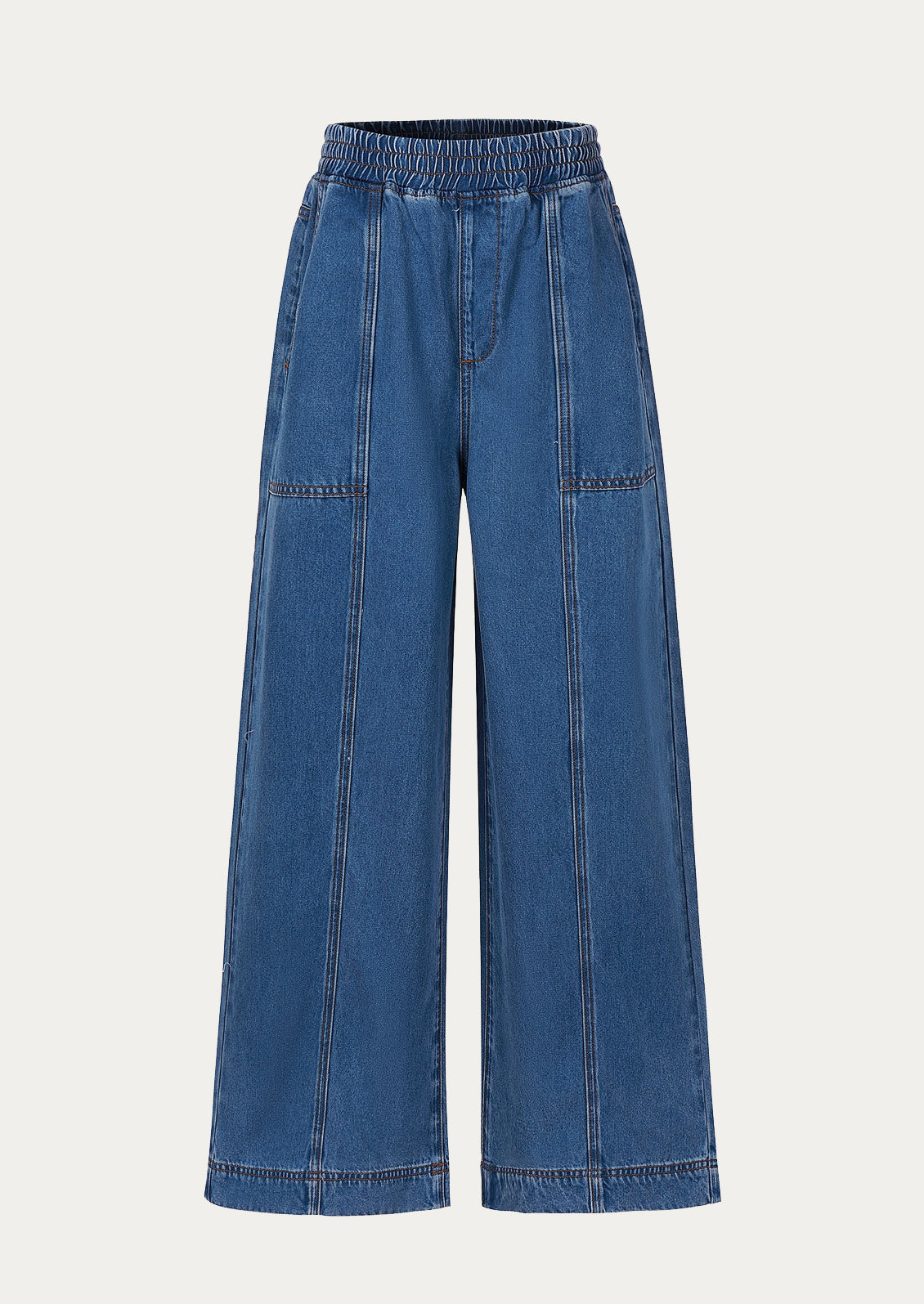 A pair of wide leg blue jeans with elasticized waistband.