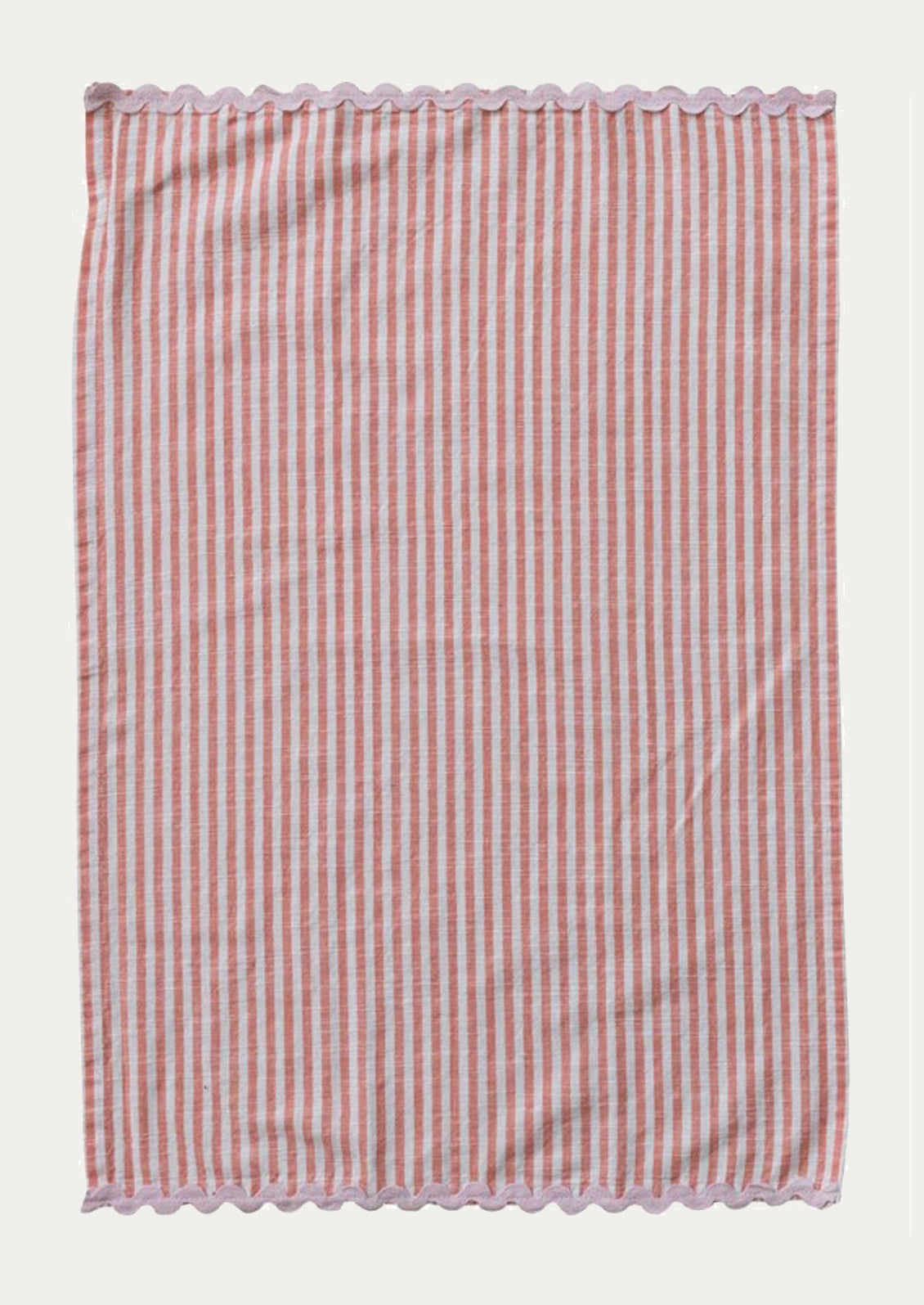 A pink and white striped tea towel with pink ric rac trim at top and bottom.