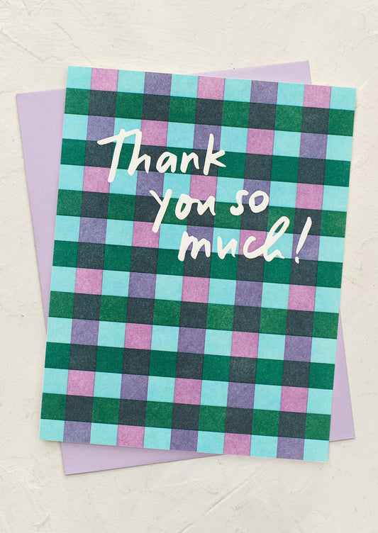 A plaid patterned greeting card reading "Thank you so much!".