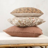 2: A stack of pillows.