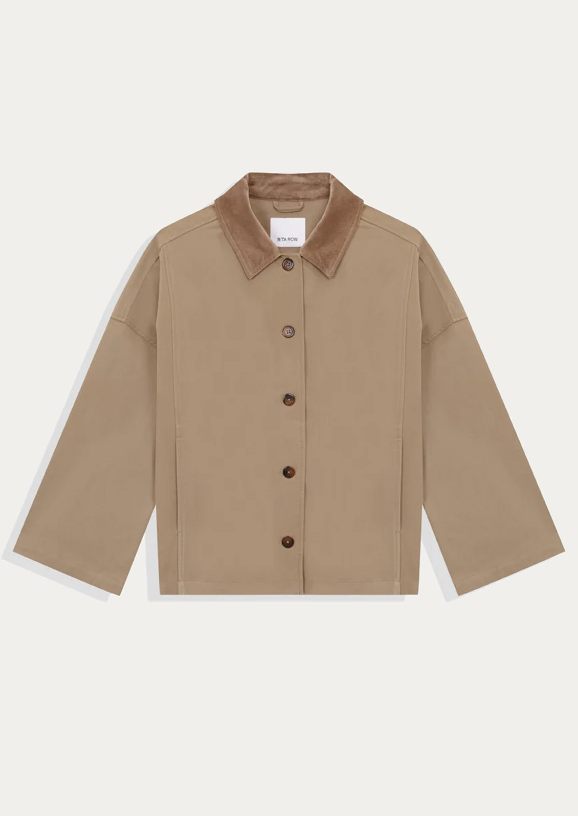 A person wearing a hip-length A-line jacket in khaki with tan contrast collar.