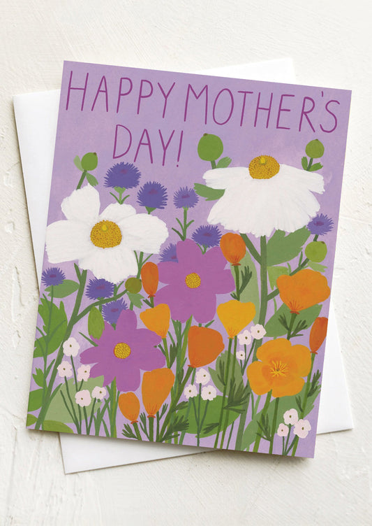 Mother's Day card with colorful flowers on a purple background