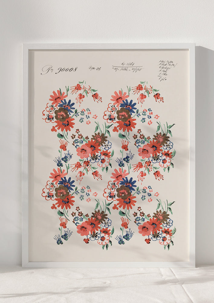 An antique inspired floral poster print in red, pink and blue, in white frame.