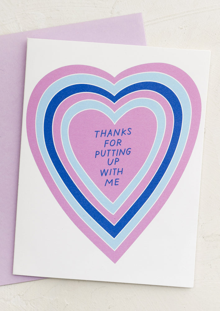 1: A heart print card reading "thanks for putting up with me".