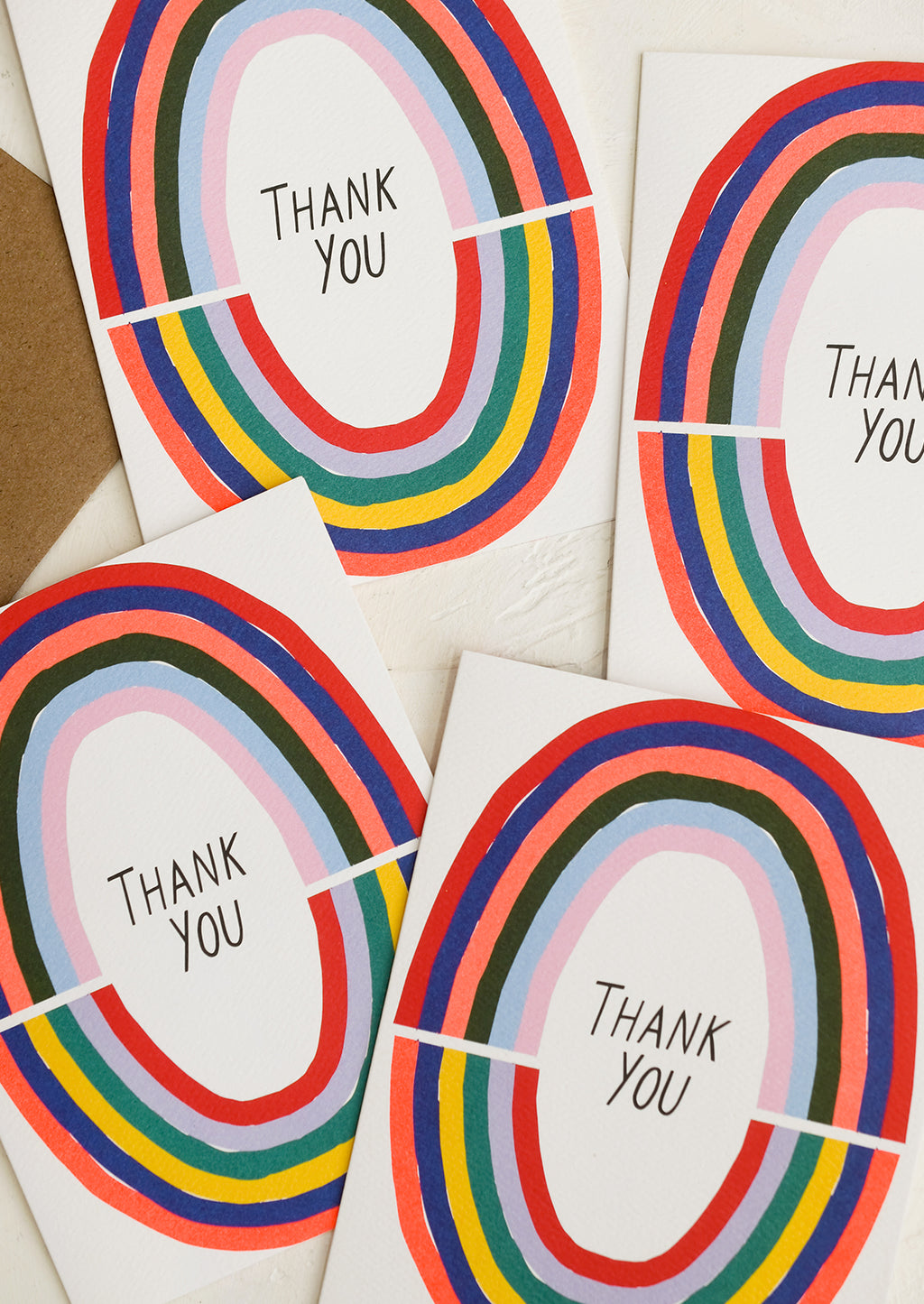 Boxed Set of 8: A set of rainbow colored thank you cards.