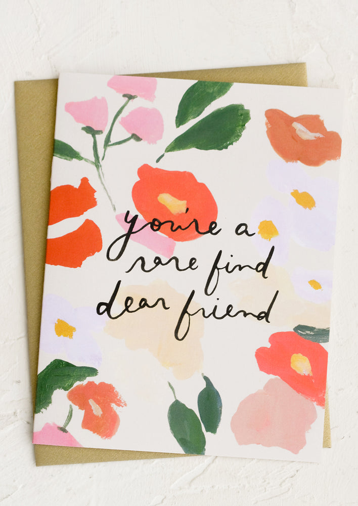 1: A floral print card reading You're A Rare Find, Dear Friend.