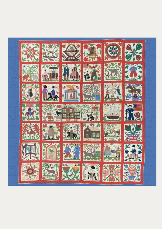 Quilt with a pattern of small square blocks featuring various scenes and figures on a blue border.