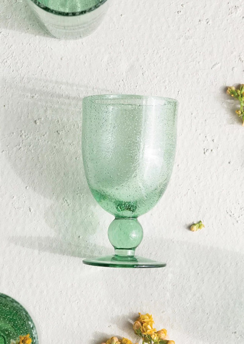 1: A wine glass made of recycled glass.