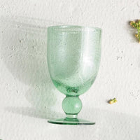 1: A wine glass made of recycled glass.