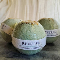 Refresh: Green bath bombs in "refresh" scent.