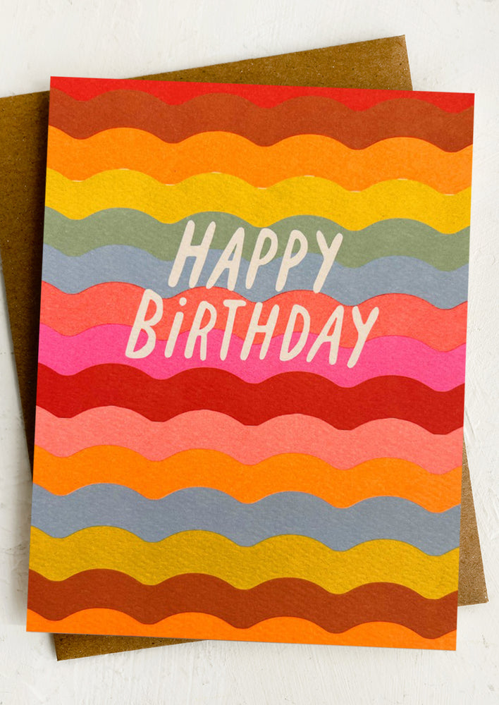 A colorful stripe print birthday card.