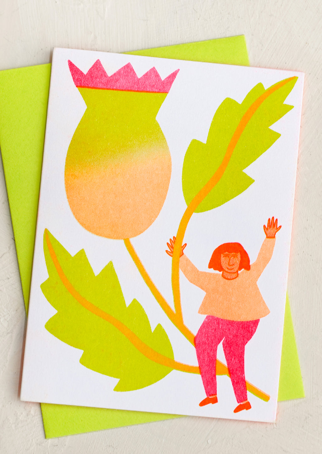 Thistle: A risograph neon printed card with image of girl holding giant thistle flower.