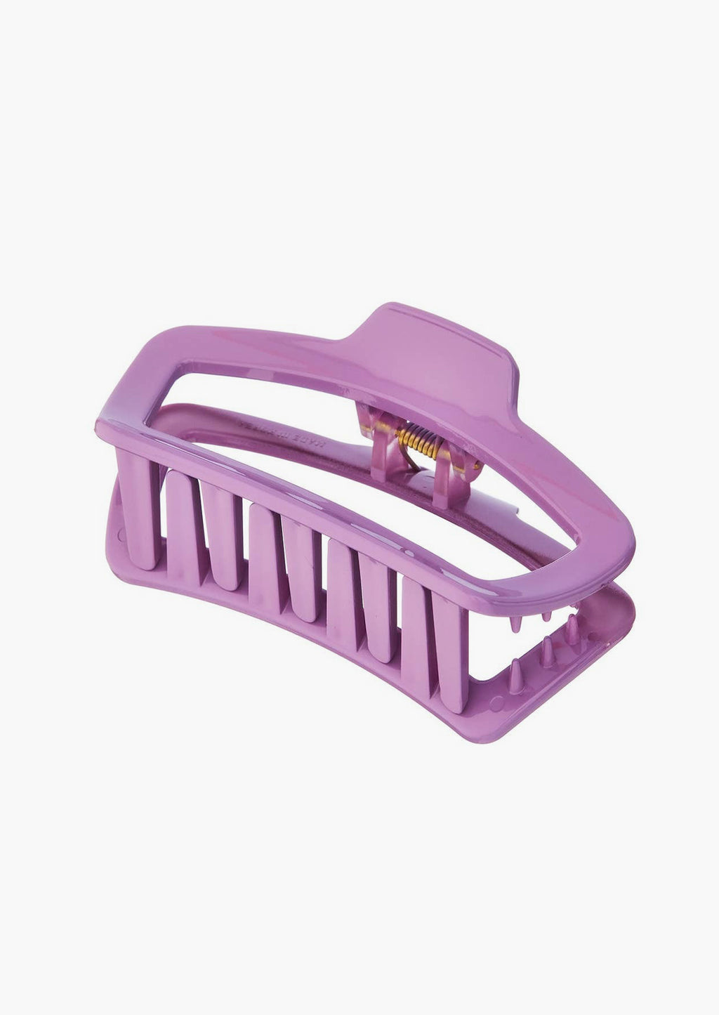Lavender: A rounded rectangle hair claw in lavender.