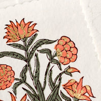 3: A block printed peach floral card with scalloped edges.