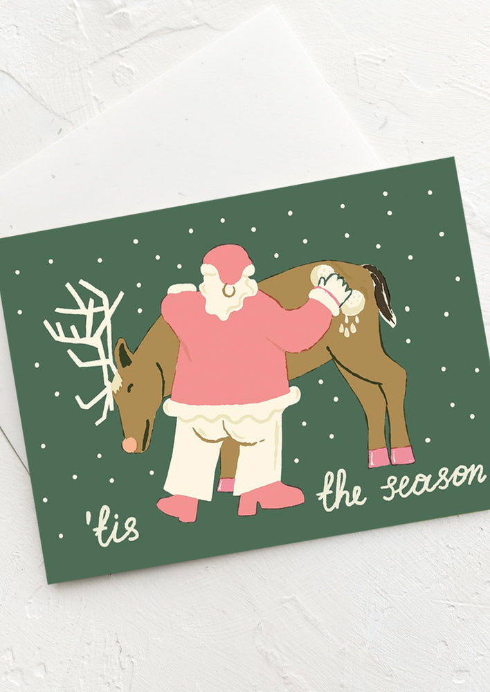 An illustrated christmas card with image of santa and rudolph.